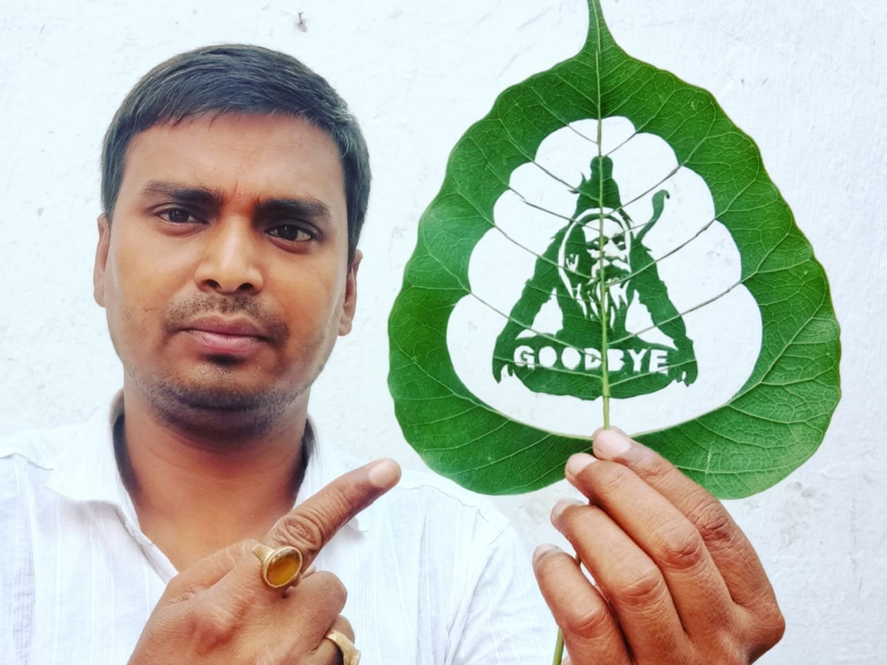 Madhurendra made a picture of Shibu Soren merged with Mahadev on Peepal leaves, "Good by Guruji"